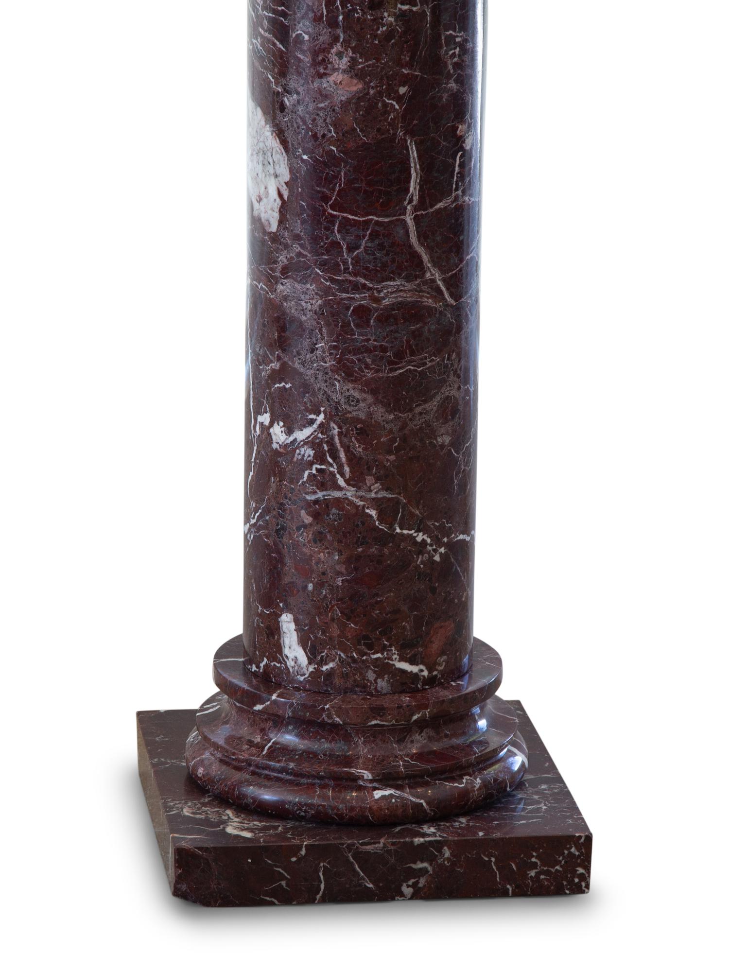 A Pair of Rouge Marble Pedestals