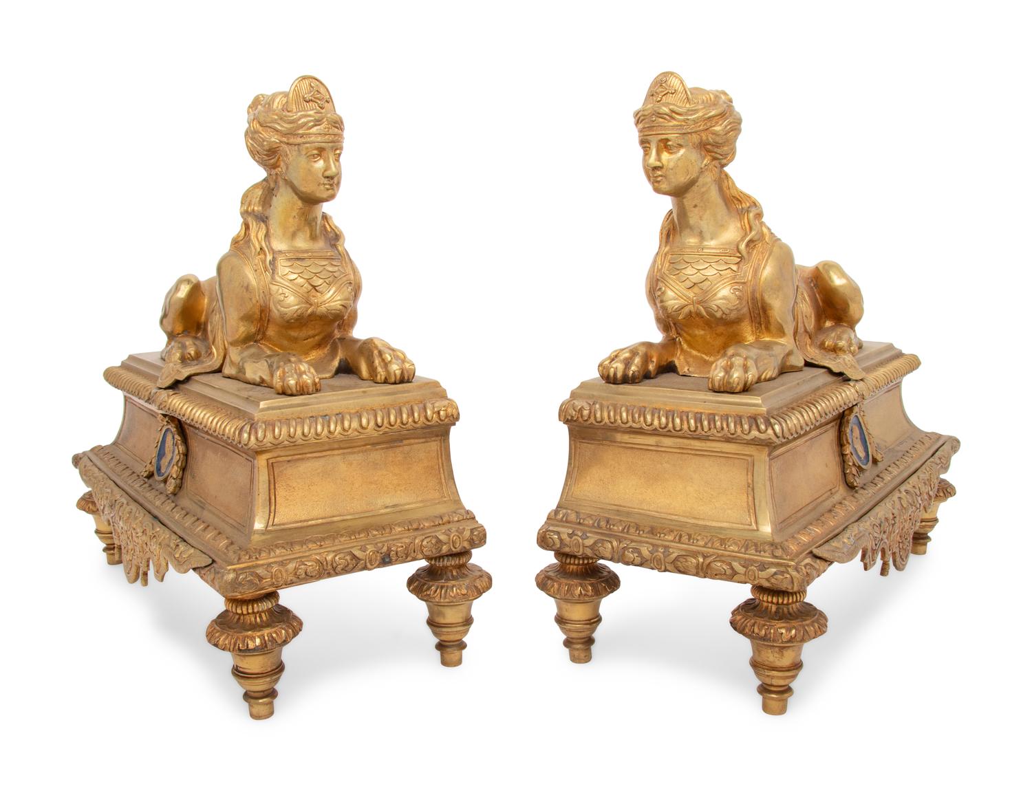 A Pair of Régence Style Gilt Bronze Chenets