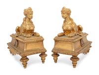 A Pair of Régence Style Gilt Bronze Chenets