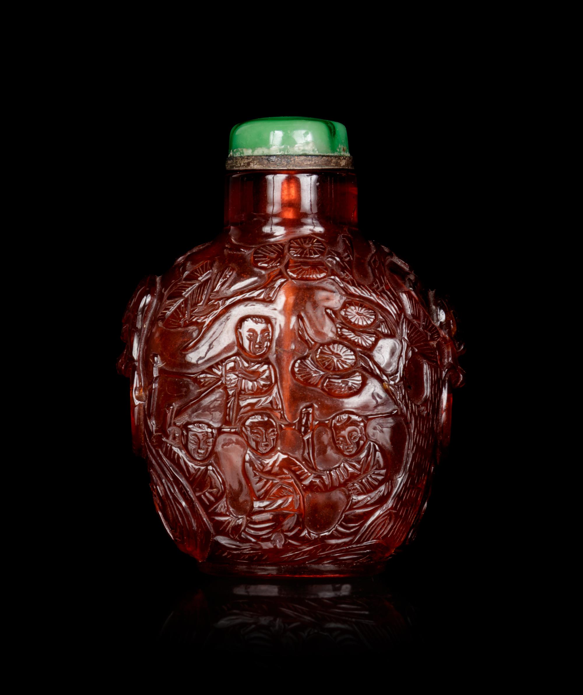 A Carved Amber Snuff Bottle