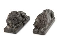A Pair of Carved Green Marble Recumbent Lions