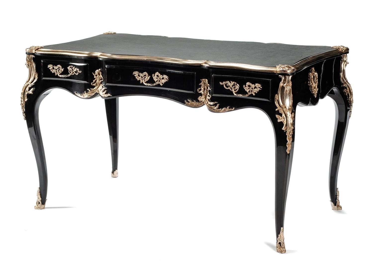 A Louis XV Style Silvered Bronze Mounted Ebonized Bureau Plat