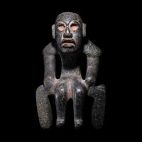 An Olmec Serpentine Seated Figure
