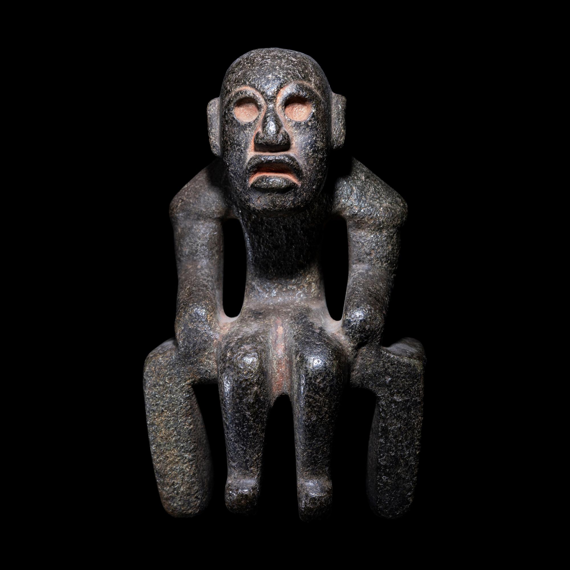 An Olmec Serpentine Seated Figure