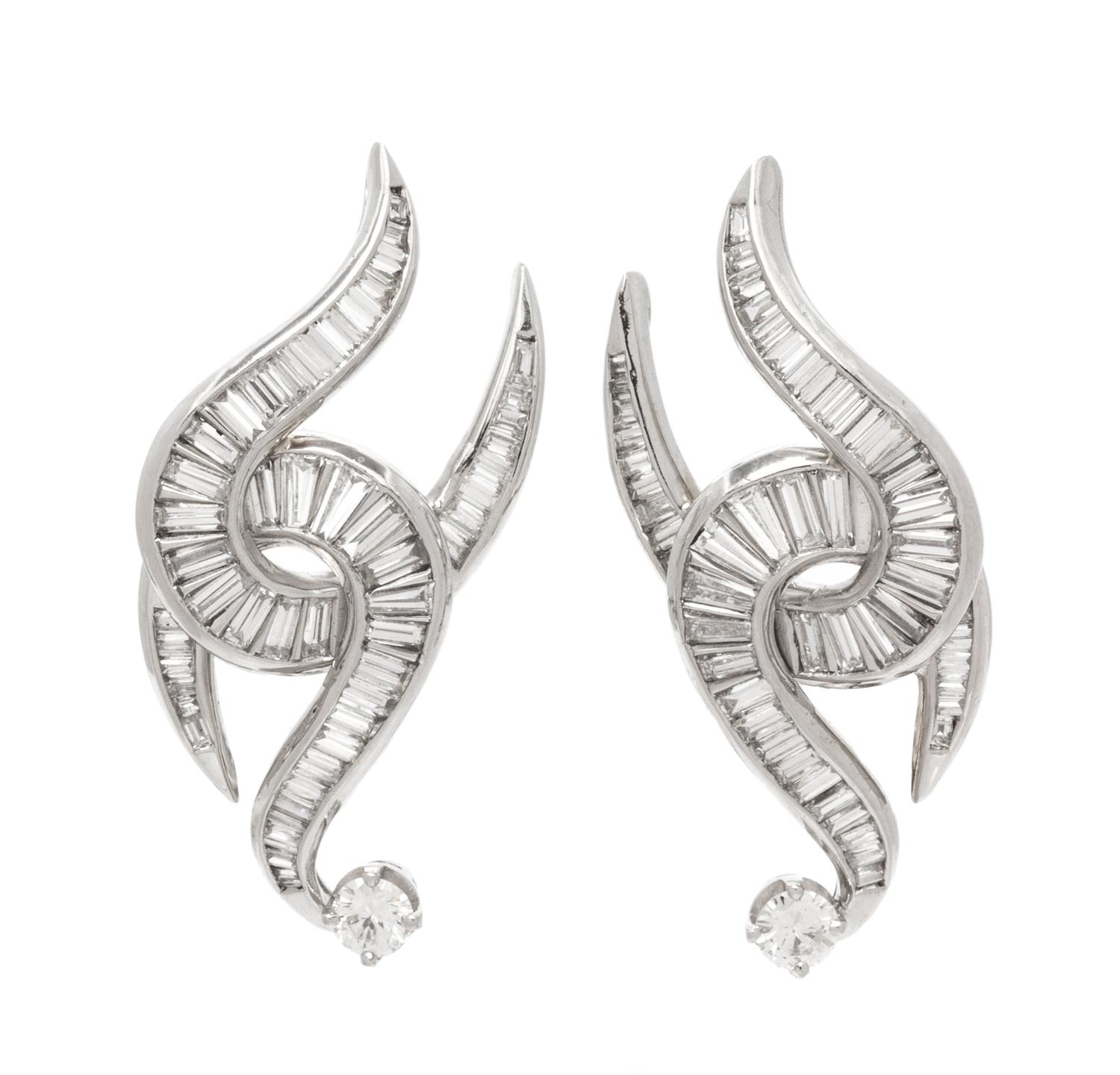 A Pair of Platinum and Diamond Earclips, 9.10 dwts.