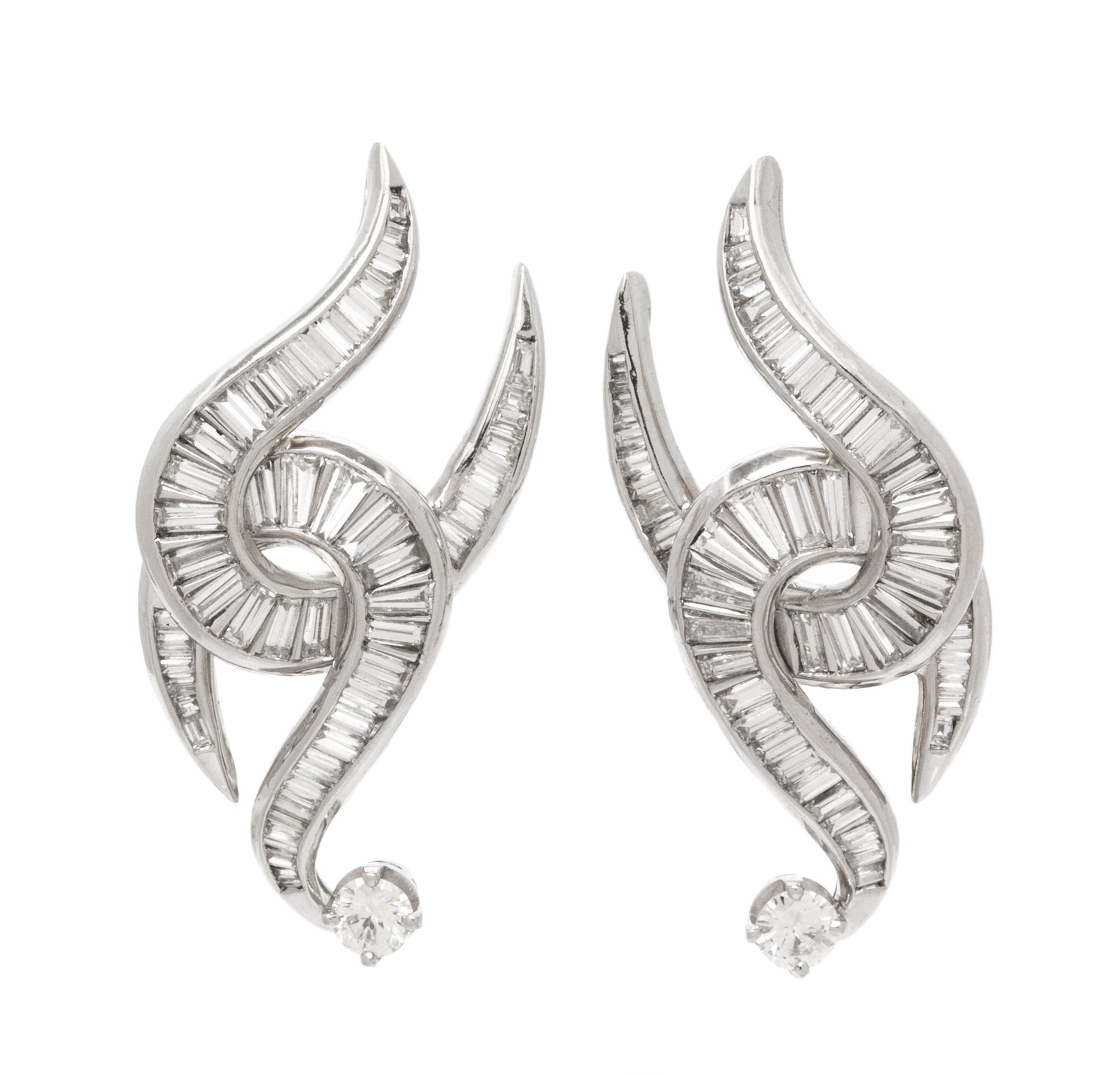 A Pair of Platinum and Diamond Earclips, 9.10 dwts.