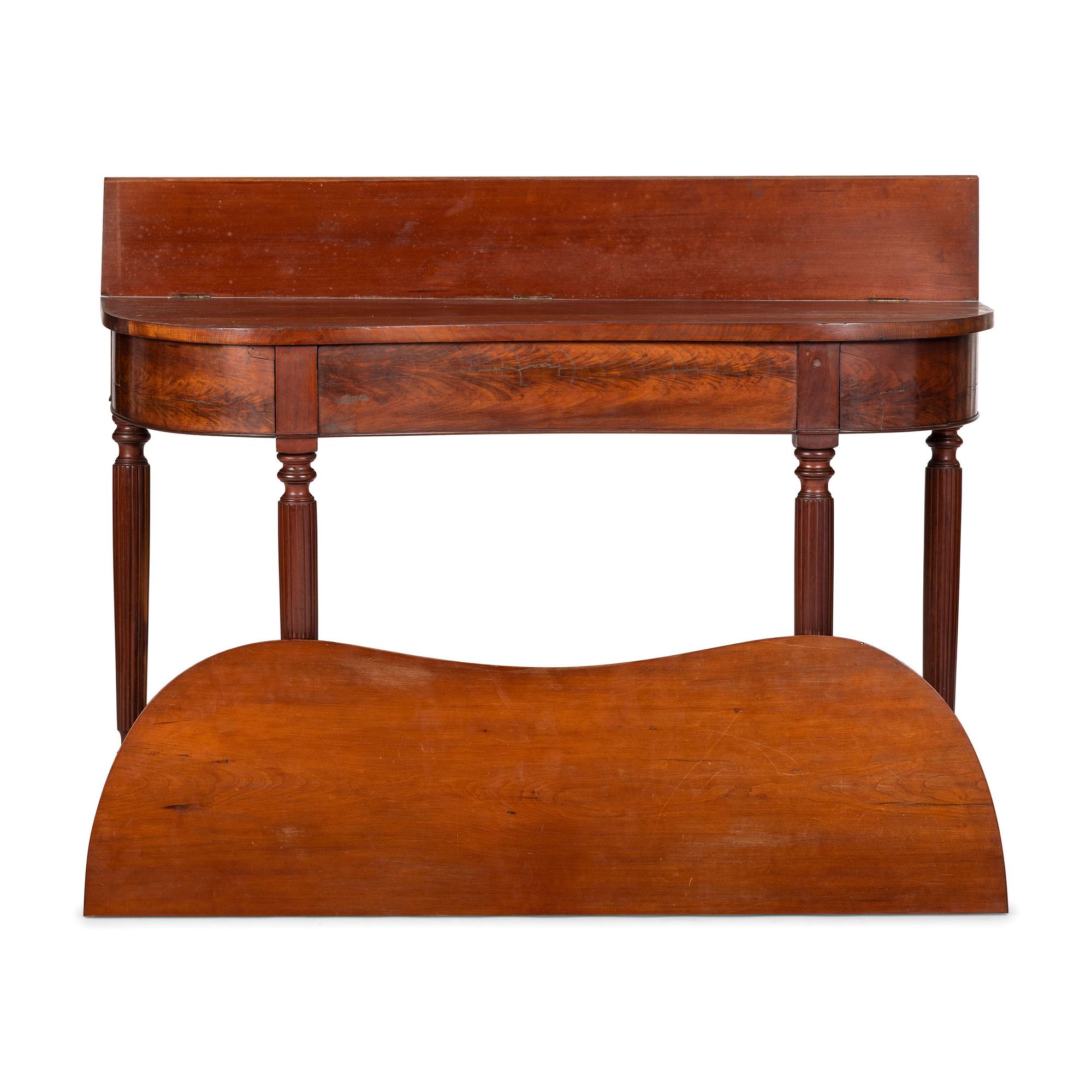 A Classical Figured Mahogany Shaped-Top Games Table