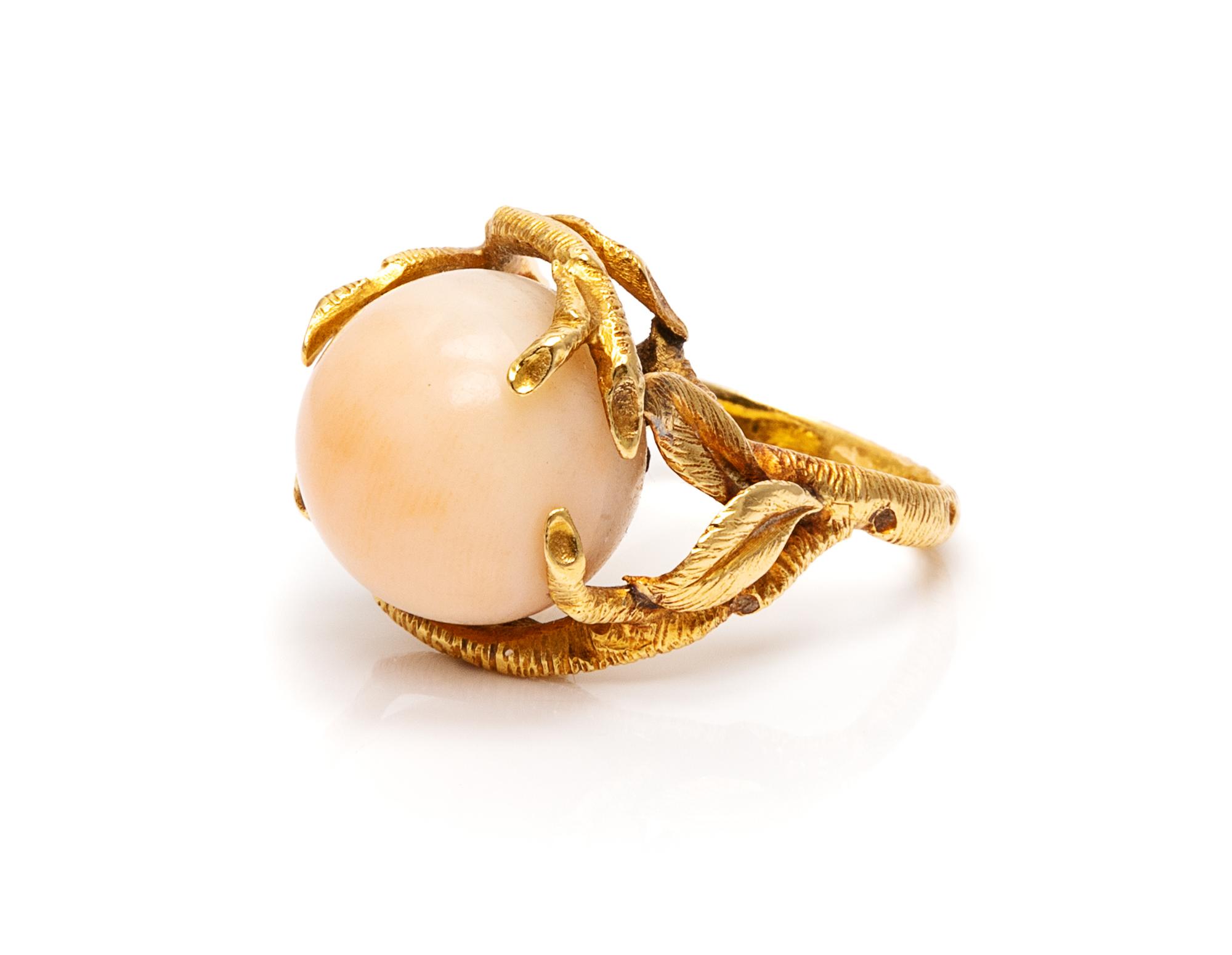 A Yellow Gold and Angel Skin Coral Ring,