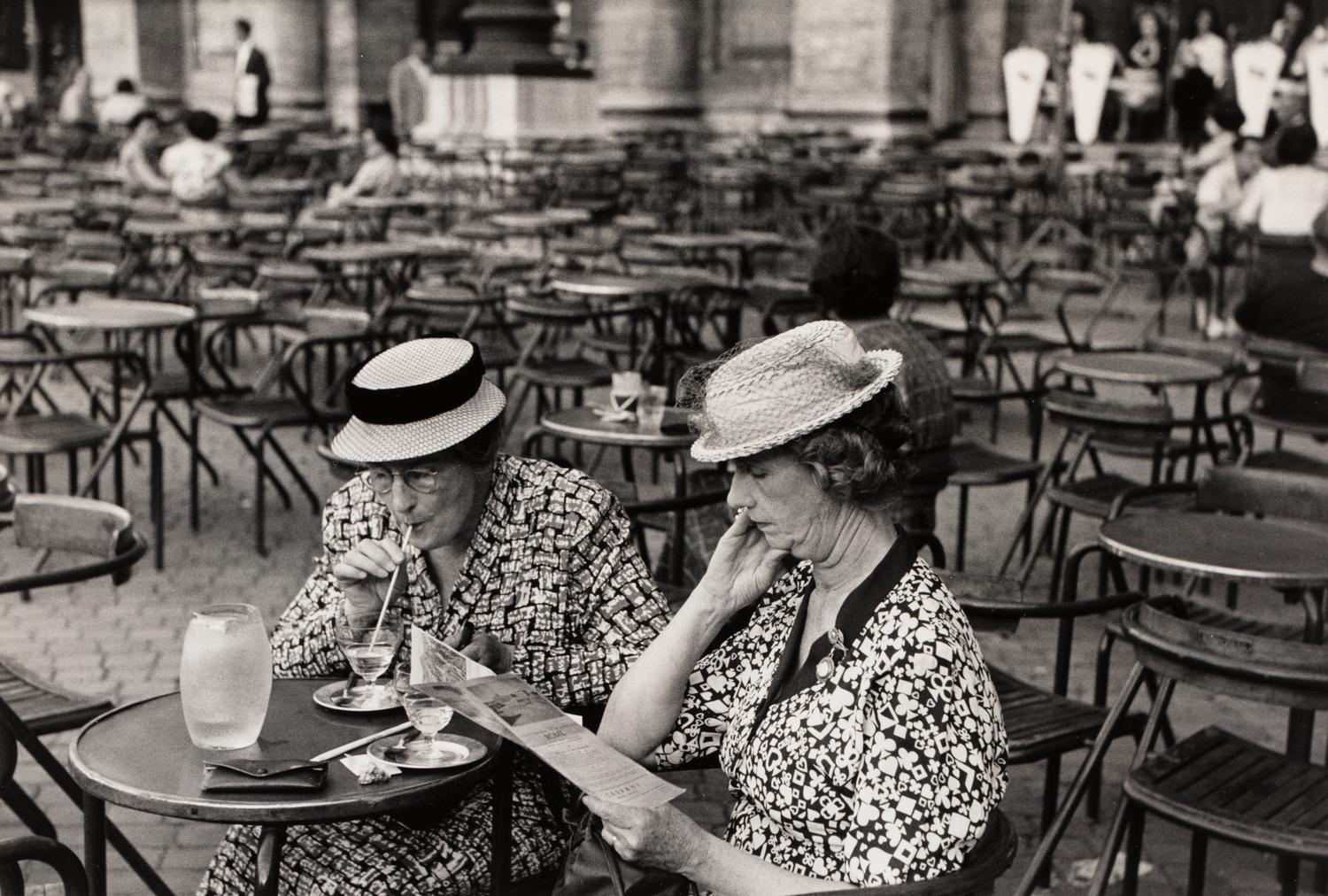 Ruth Orkin (1921-1985) Two American Tourists Waiting for Tour Bus, Rome, Italy, 1951
