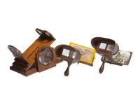 [STEREOVIEWS]. Three vintage stereoscopes, incl. tabletop example. [ With: ] Stereoviews and poster.