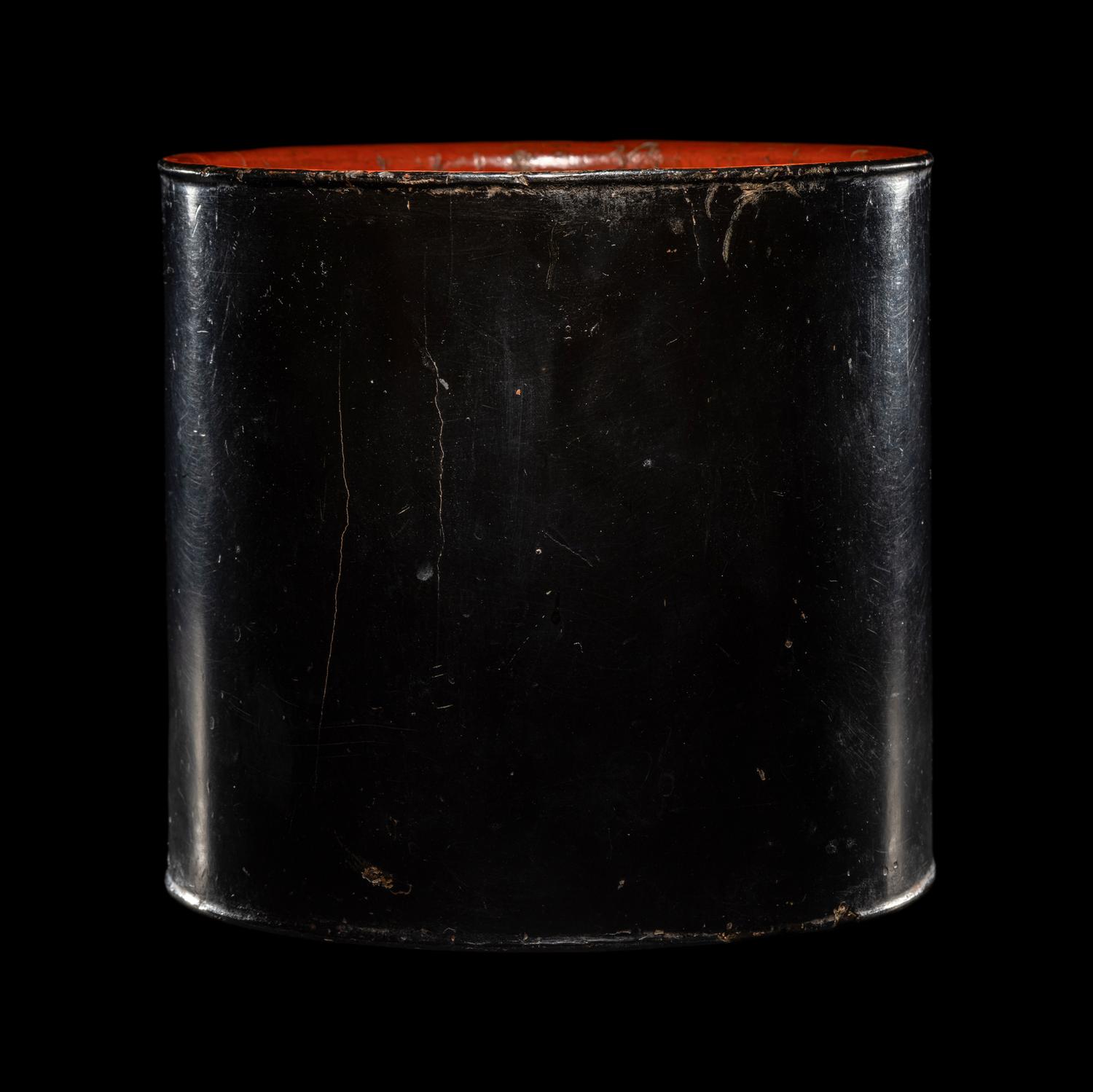 A Chinese Black and Red Lacquered Brushpot, Bitong, Wanli Mark 萬曆丙午（1606）款黑漆素面筆筒