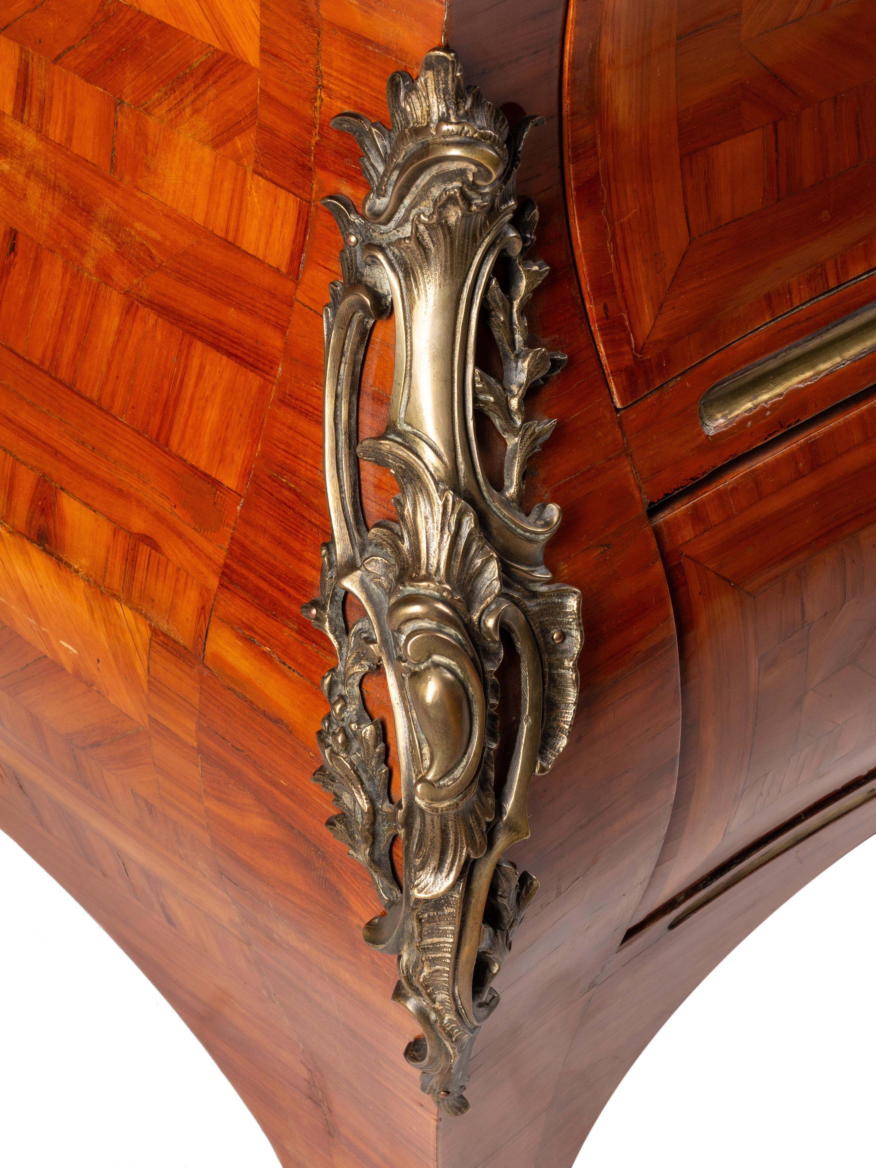 A Louis XV Style Gilt Bronze Mounted Parquetry Marble-Top Commode