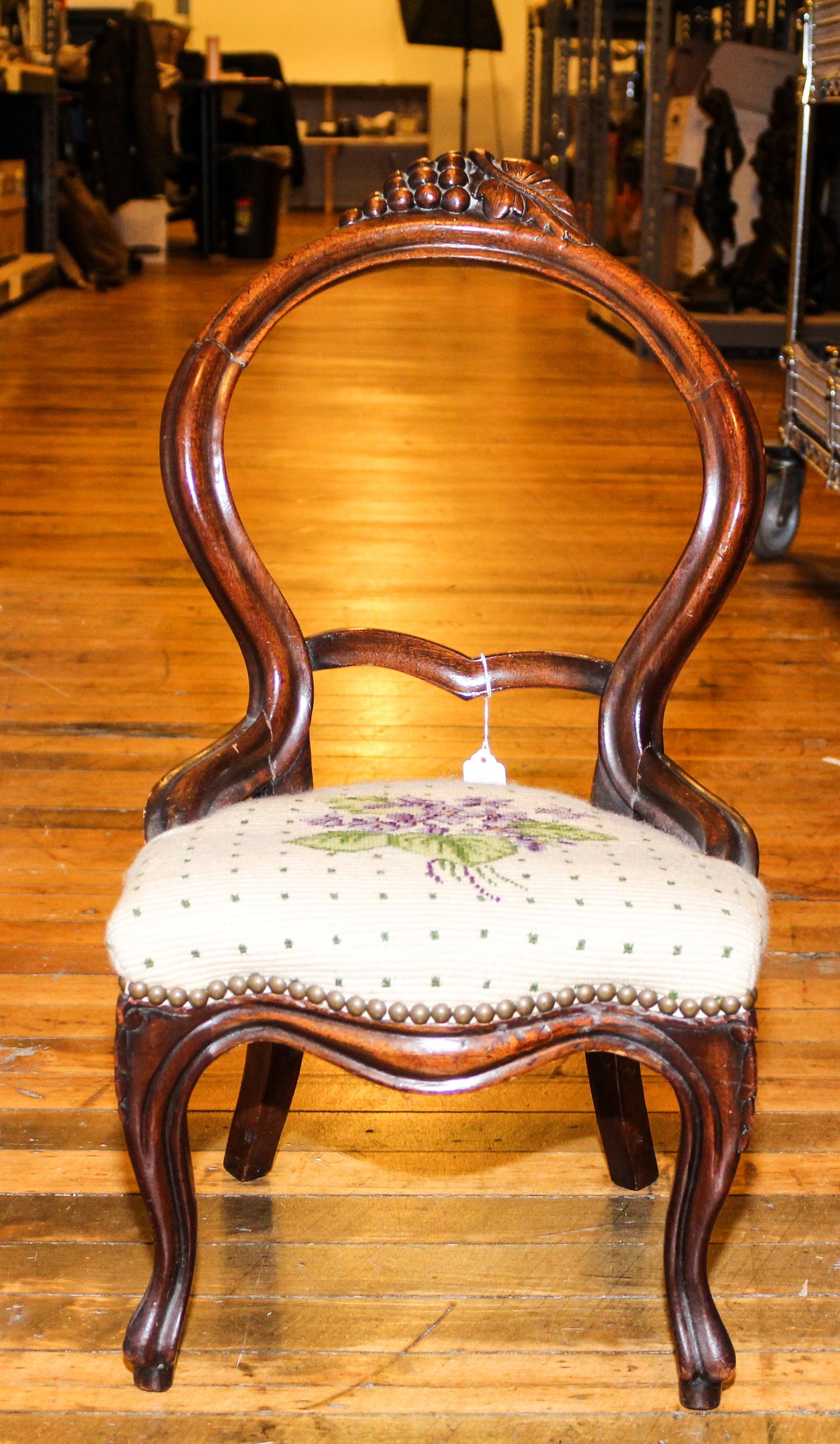A Victorian Mahogany Child's Chair. Height 24 inches.