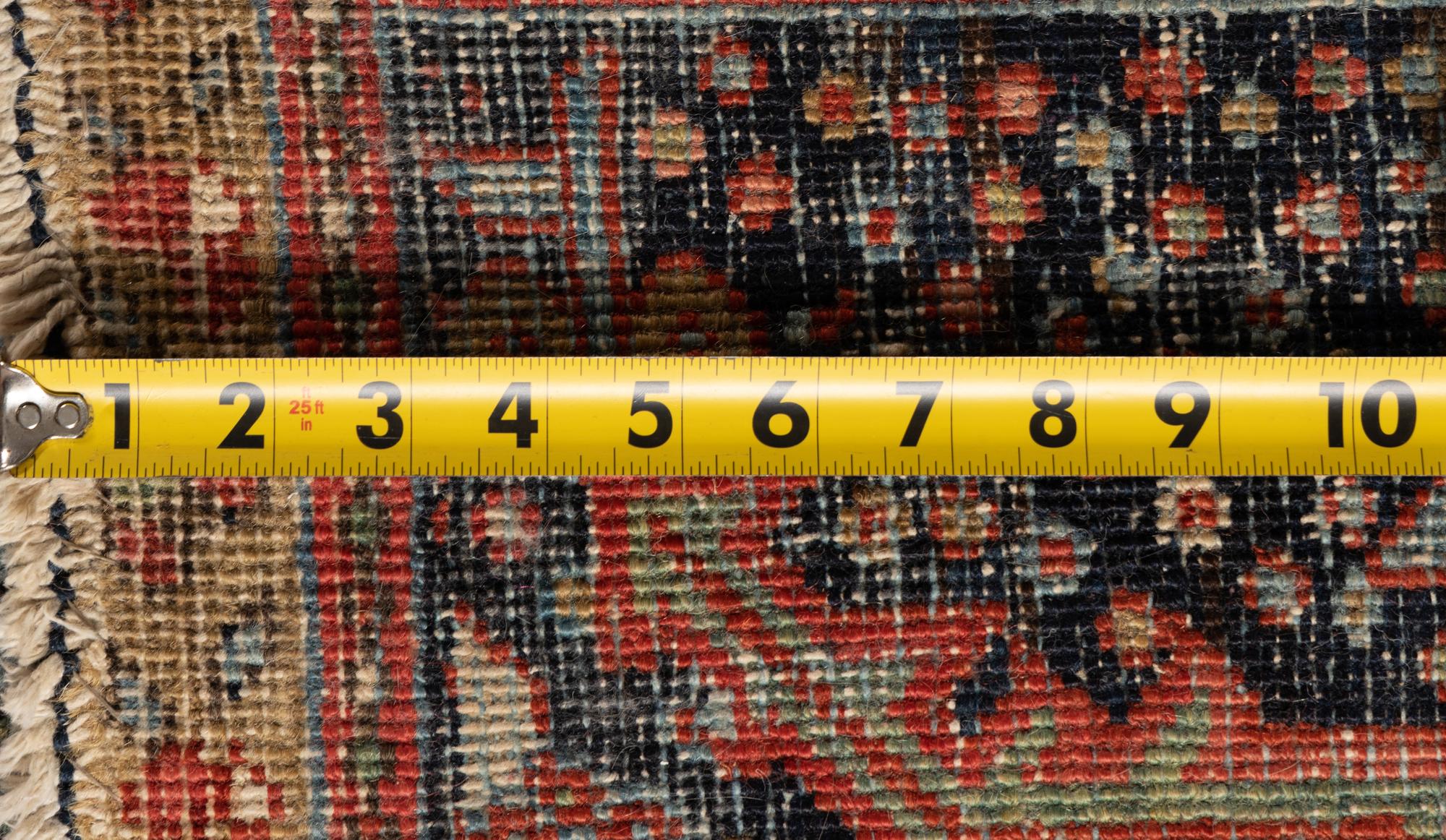 A Heriz Wool Rug