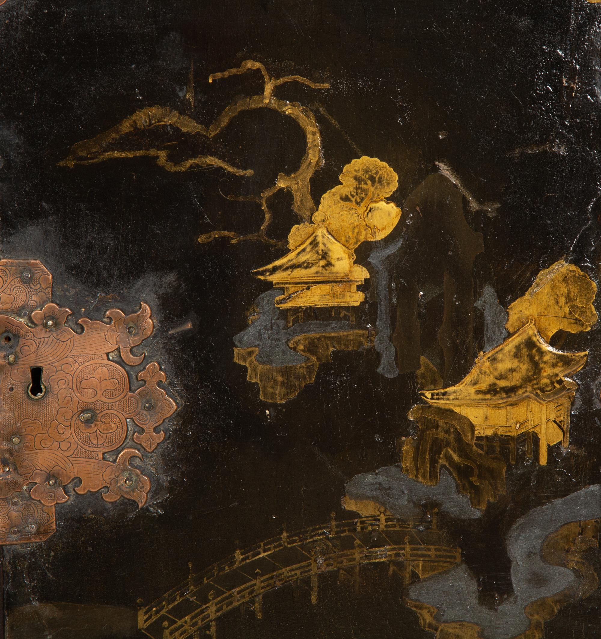 A Chinese Black and Gilt Lacquered Cabinet on Stand