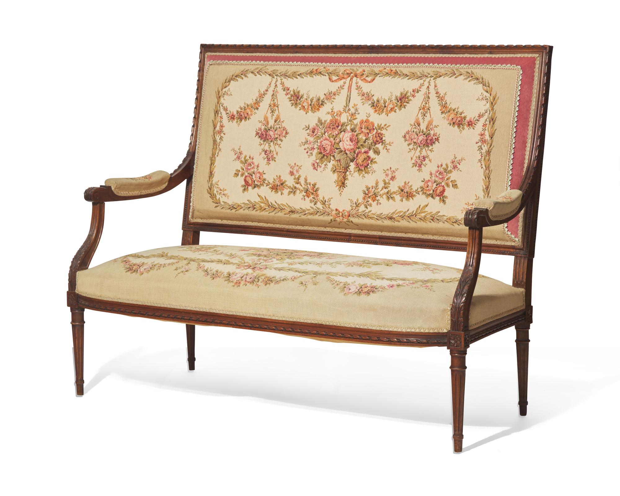 A Louis XVI Style Carved Mahogany Canapé