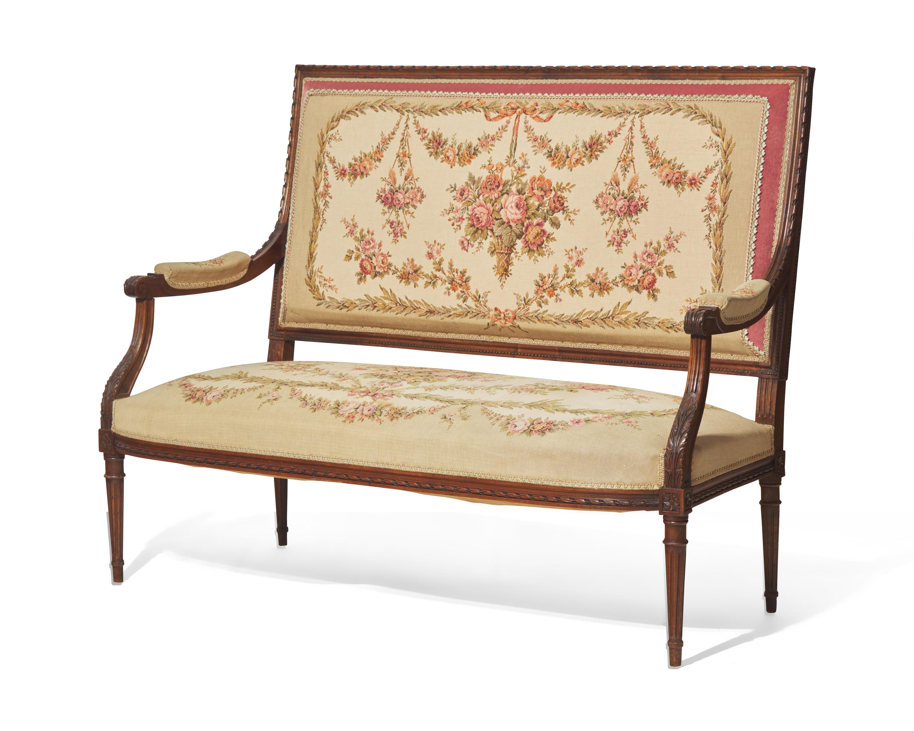 A Louis XVI Style Carved Mahogany Canapé
