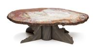 A Fossilized Wood Table Top and Iron X-Form Base Height 19 3/4 x width 33 x depth 61 1/2 inches.