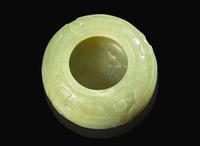 A Chinese carved greenish-yellow jade archaistic coupe Qing dynasty, 18th/19th century 倣古青黃玉水丞 清 十八或十九世紀