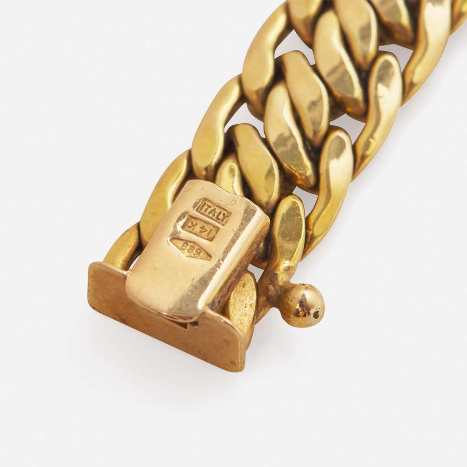 A 14K Yellow Gold and Gemstone Brooch and 14K Yellow Gold Chain