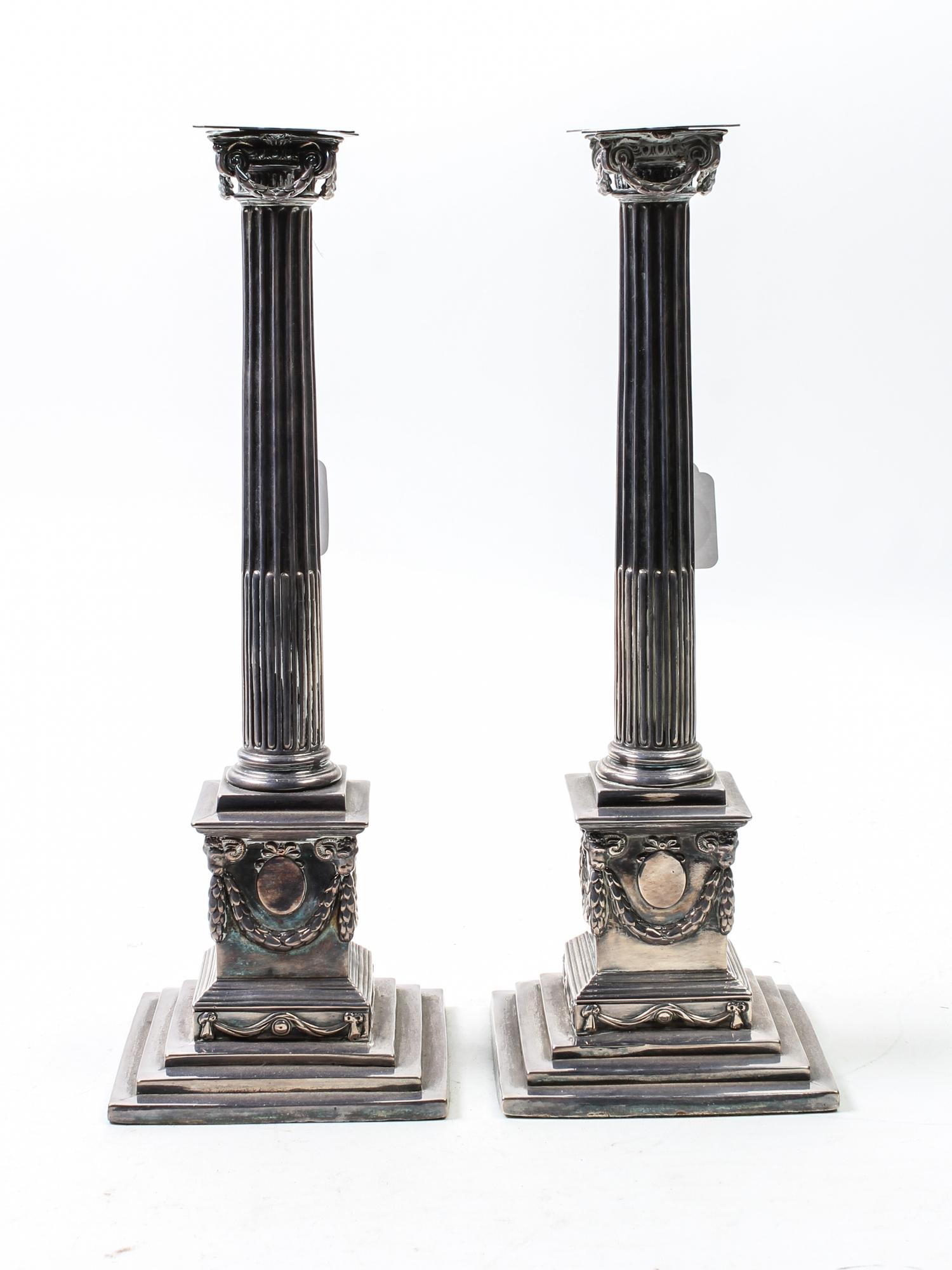 A Pair of English Silver-Plate Candle Holders Height 15 inches. — 19TH CENTURY