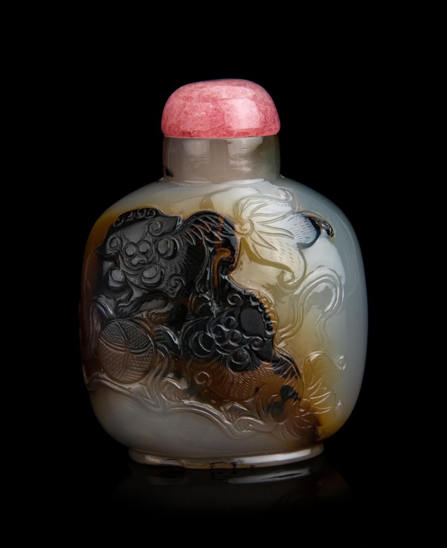 A Chinese Carved Agate 'Fu Lion' Snuff Bottle
