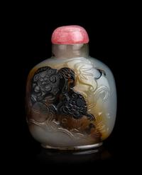 A Chinese Carved Agate 'Fu Lion' Snuff Bottle
