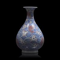 A Chinese Underglazed Blue and Red Porcelain Vase, Yuhuchunping 青花釉裡紅海水魚紋玉壺春瓶