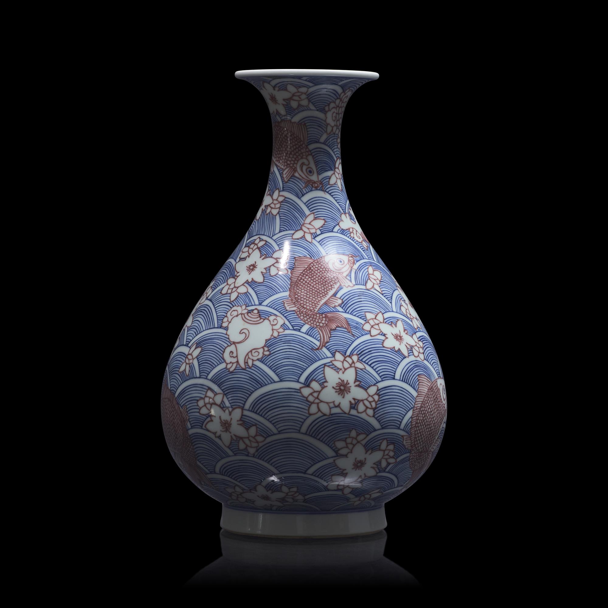A Chinese Underglazed Blue and Red Porcelain Vase, Yuhuchunping 青花釉裡紅海水魚紋玉壺春瓶