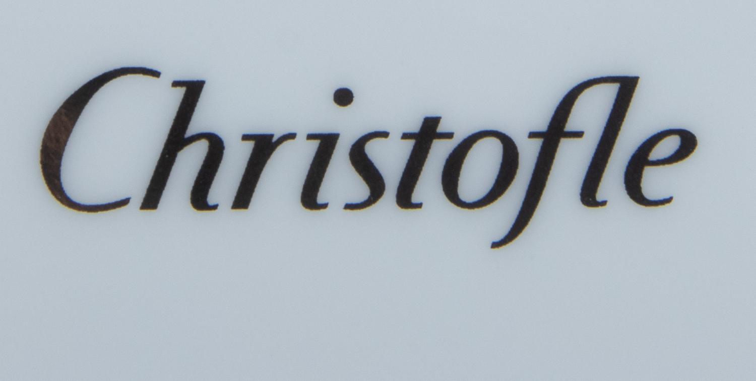 A Set of Twelve Christofle Porcelain Chargers