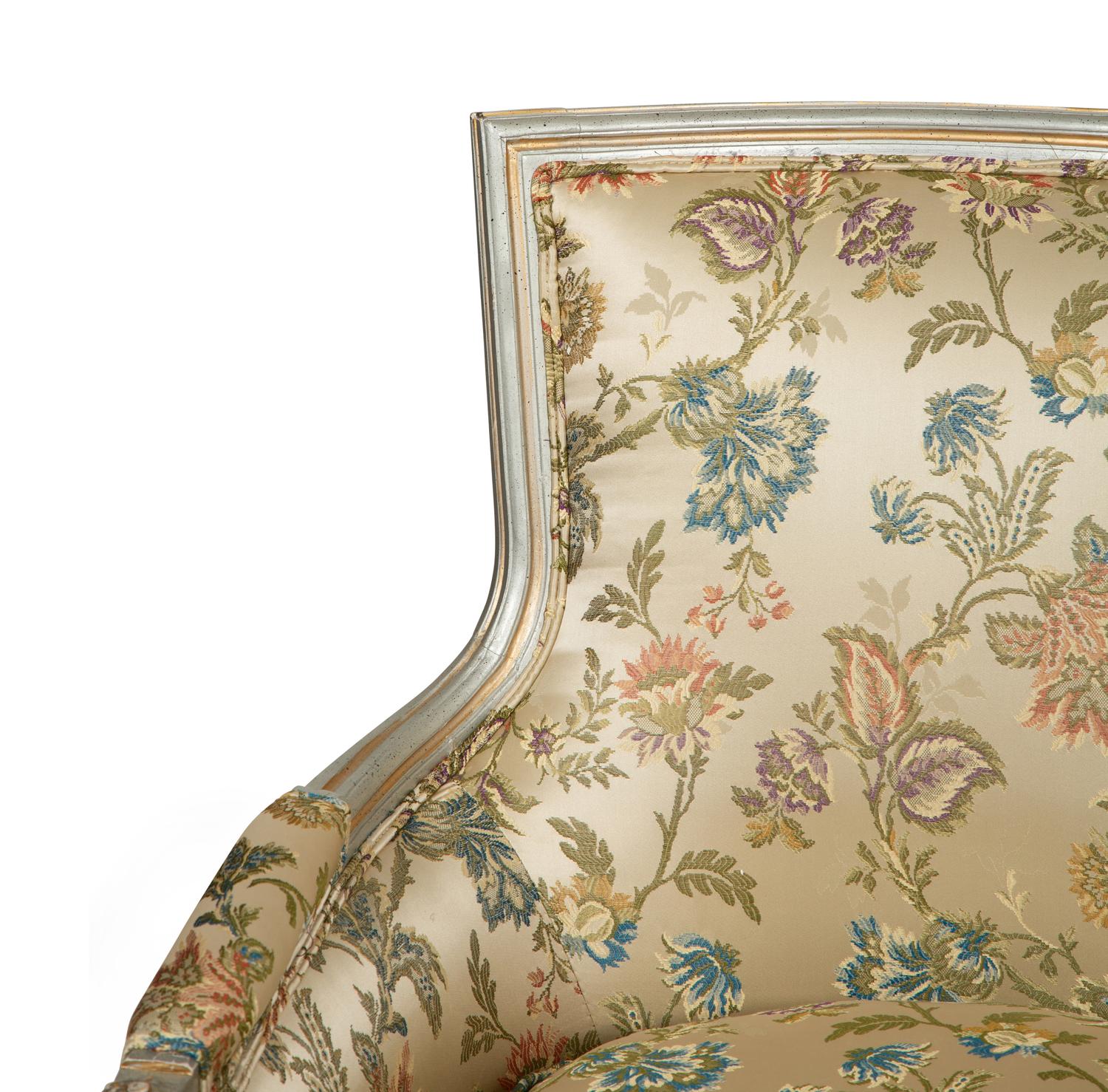 A Pair of Louis XVI Style Painted and Parcel Gilt Bergères