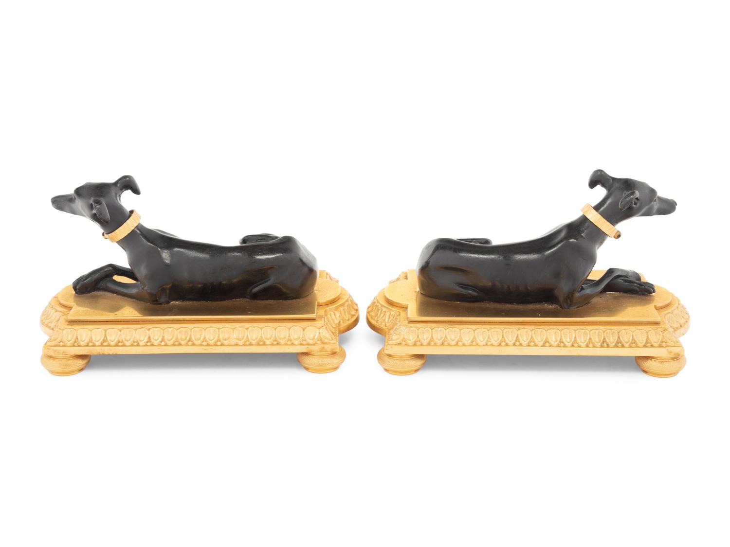 A Pair of French Gilt and Patinated Bronze Models of Greyhounds