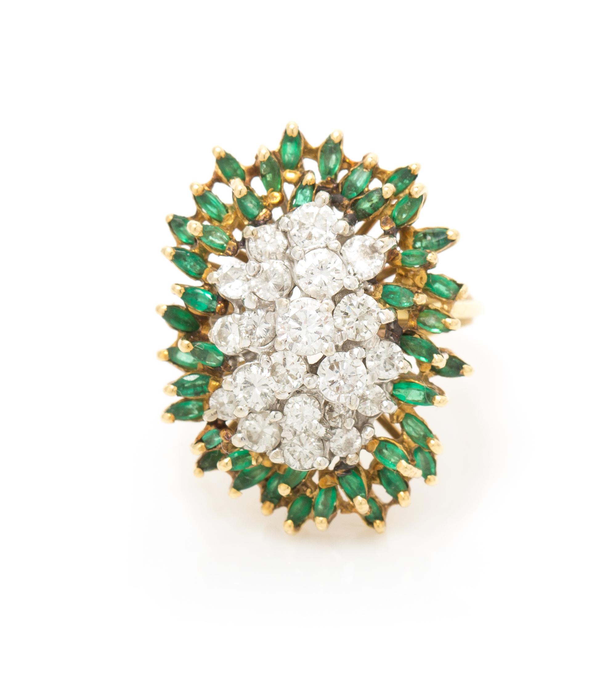 An 18 Karat Gold, Diamond and Emerald Cluster Ring, 7.50 dwts.
