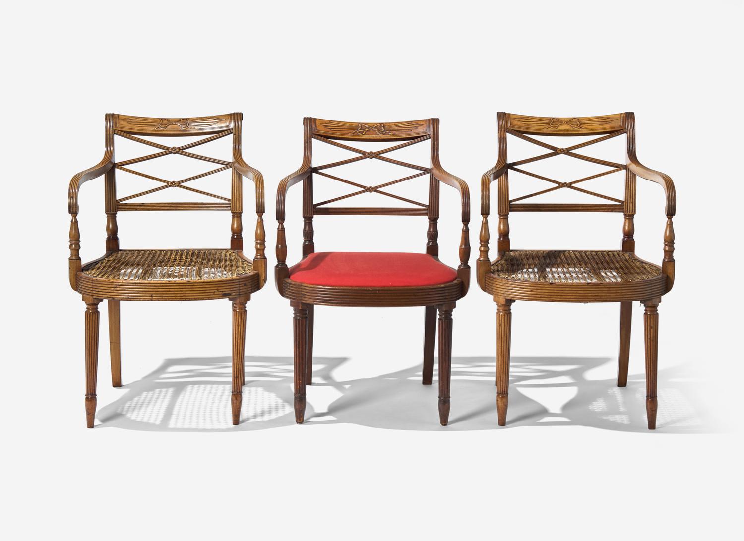 A Pair and Two Similar Federal Carved Mahogany Armchairs