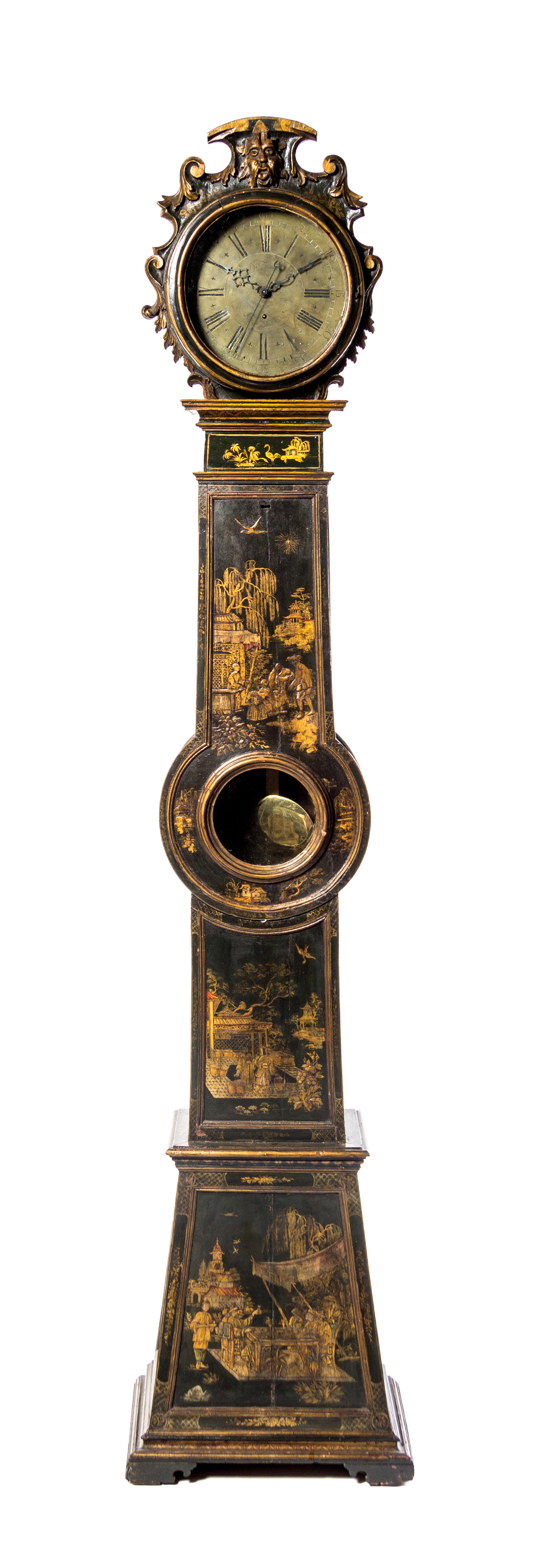 An English Lacquered Tall Case Clock, Height 94 inches.