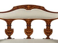 An Edwardian Mahogany and Marquetry Settee