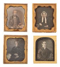 [EARLY PHOTOGRAPHY]. A group of 23 daguerreotypes featuring subjects posed with cased images, including: