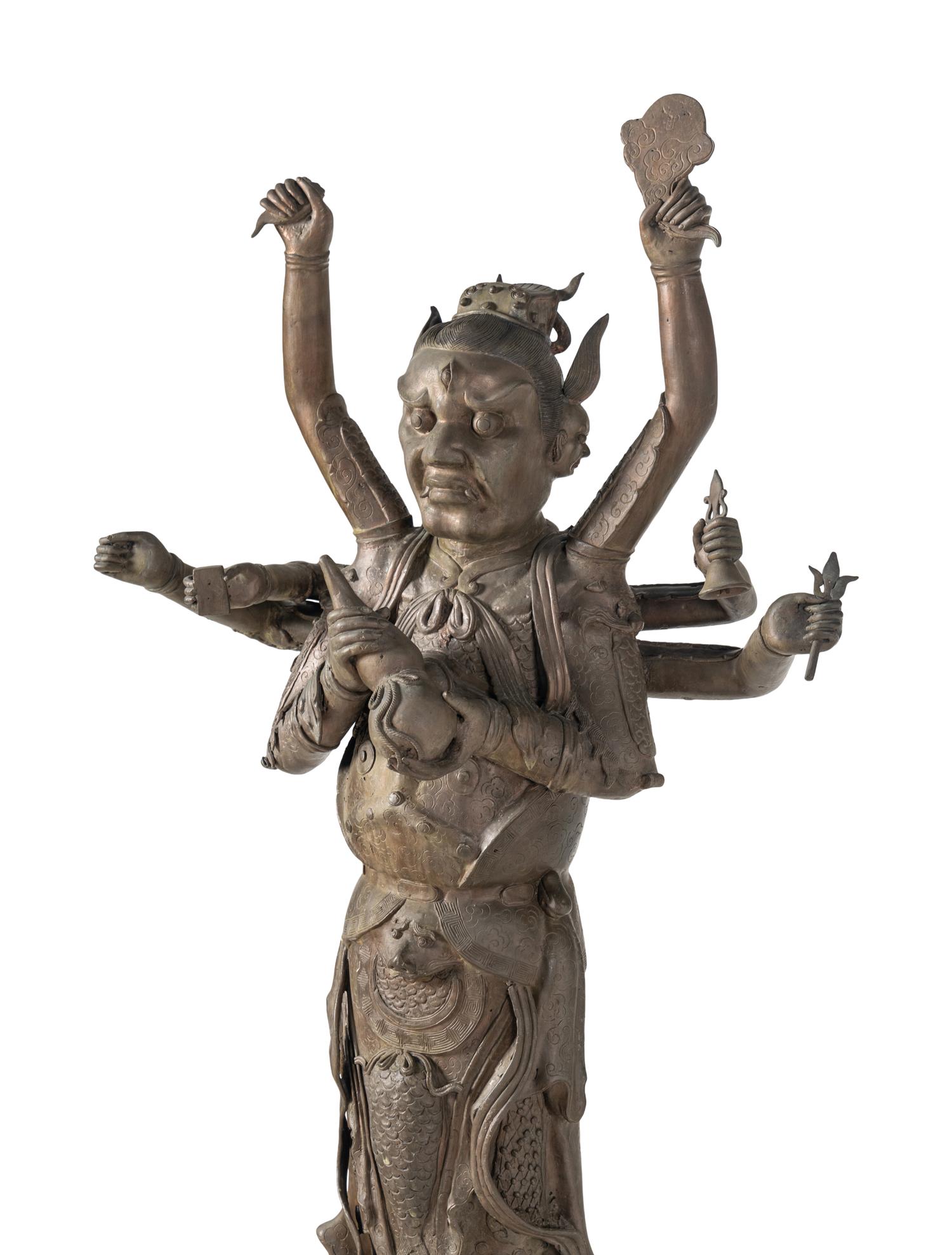 A Large Chinese Bronze Figure of a Deity