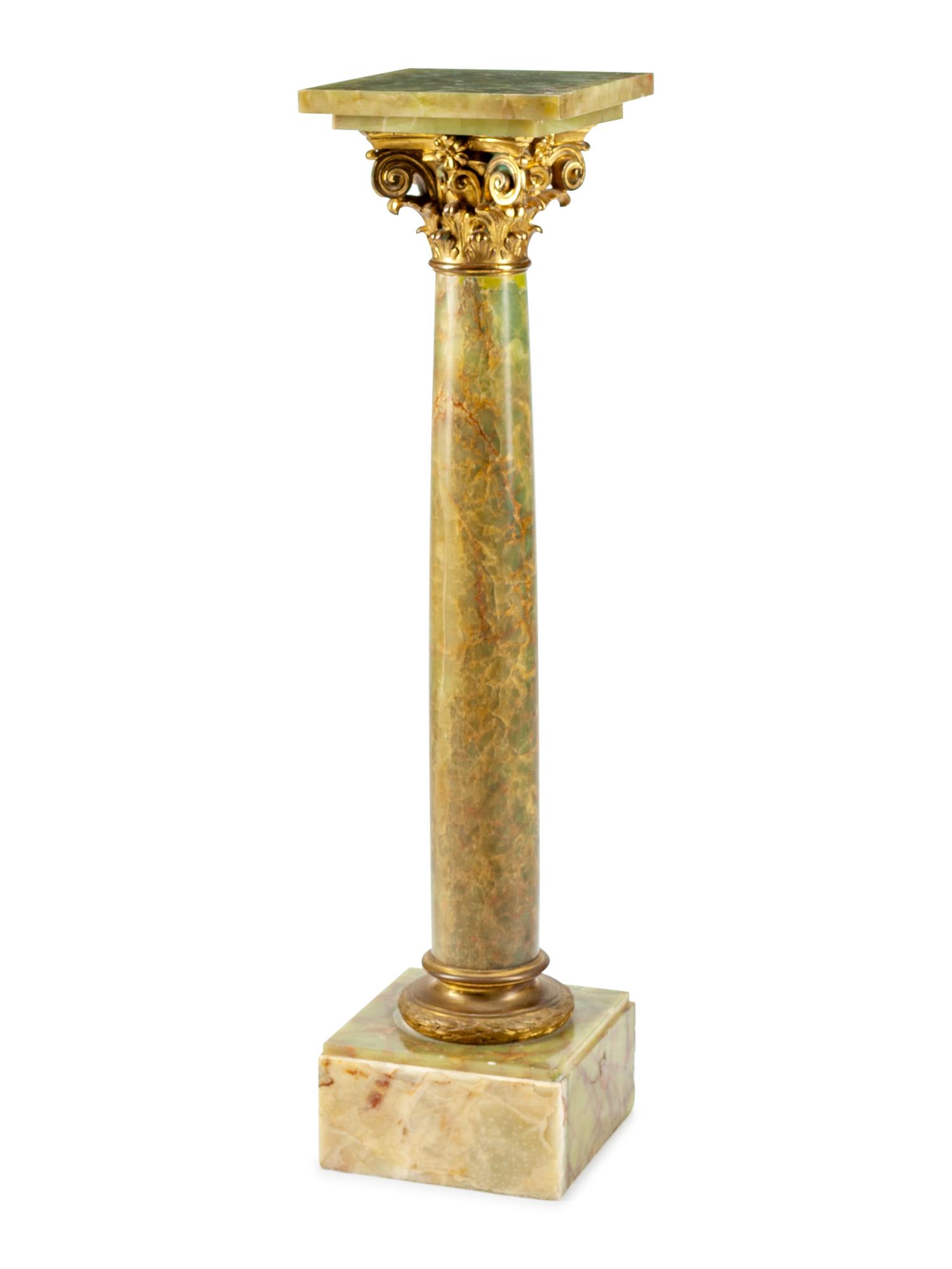A Louis XVI Style Gilt Bronze Mounted Onyx Pedestal