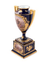 A Sèvres Style Painted and Parcel Gilt Porcelain Urn on Stand