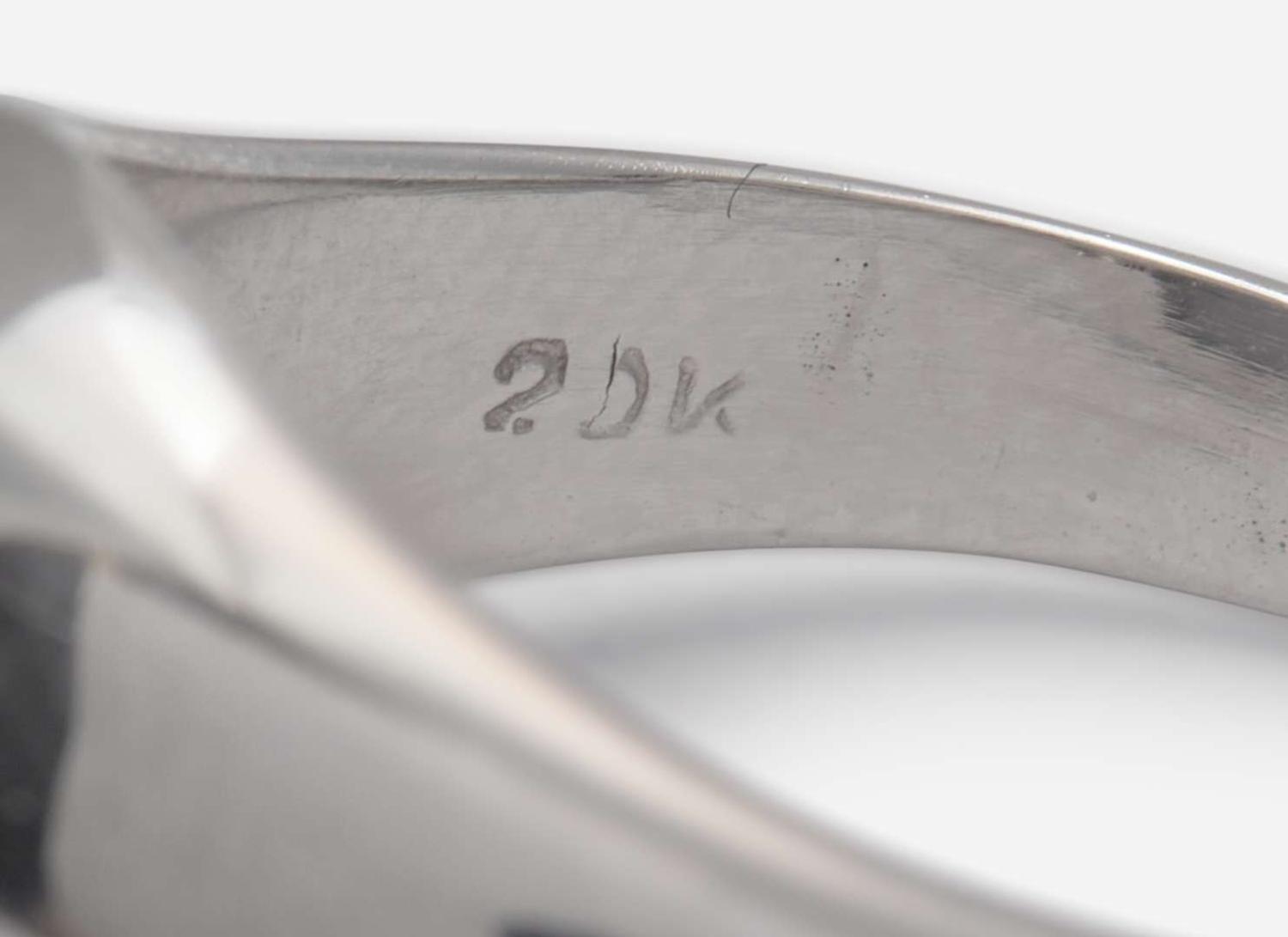 A 20K White Gold, Star Sapphire, and Diamond Ring