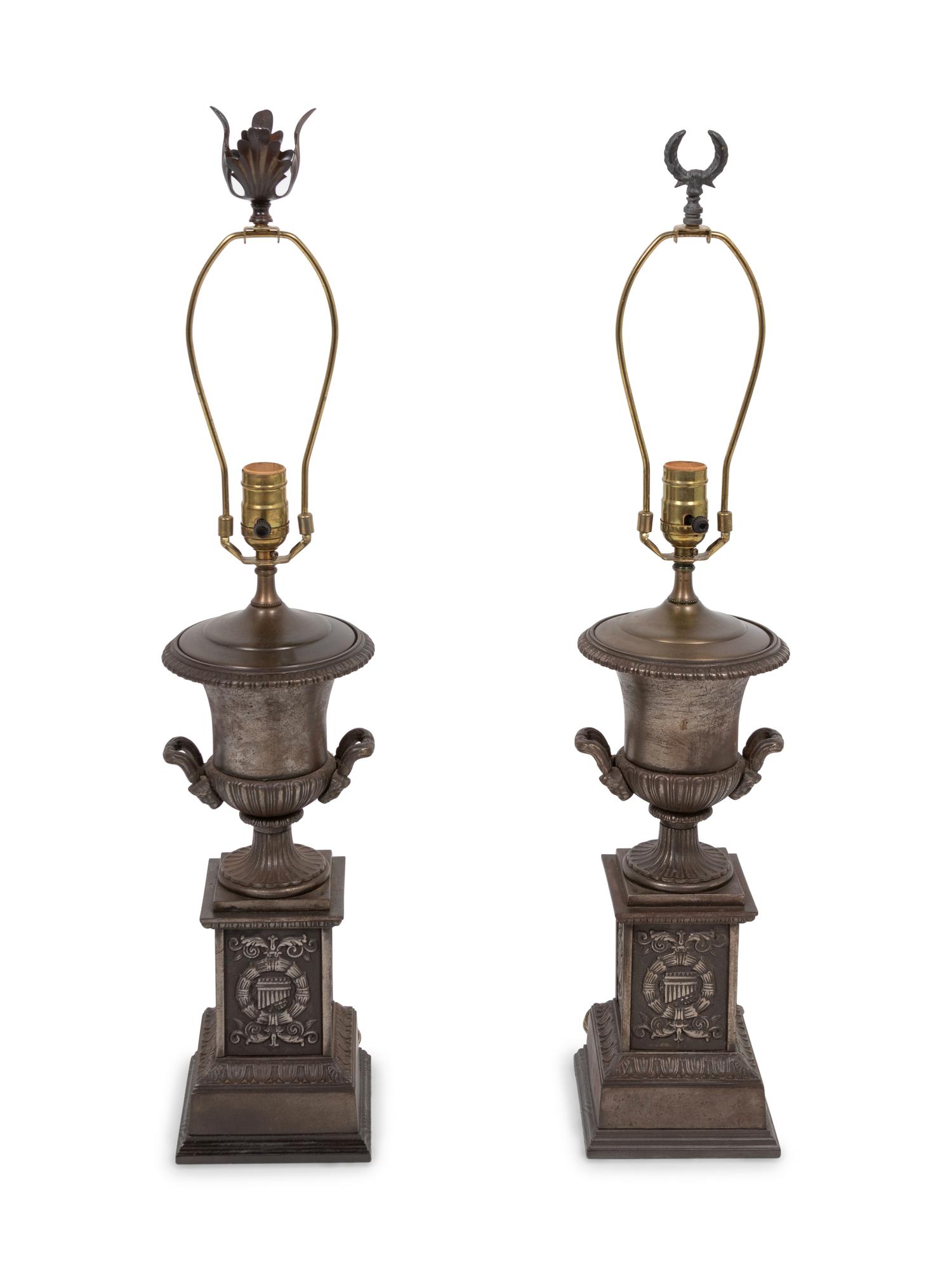 A Pair of Cast Iron Urns Mounted as Lamps