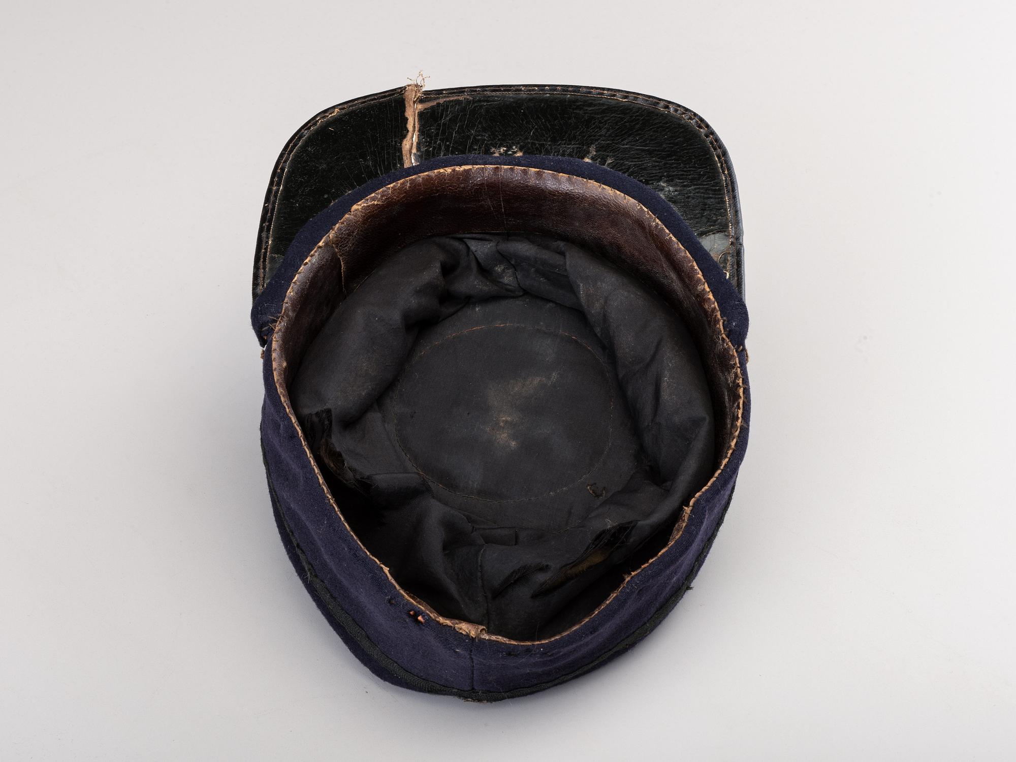 [CIVIL WAR]. Private purchase officer's sack coat, kepi, and carpet bag identified to Lieutenant Albert C. Sparks, Co. B, 37th Massachusetts Volunteers.