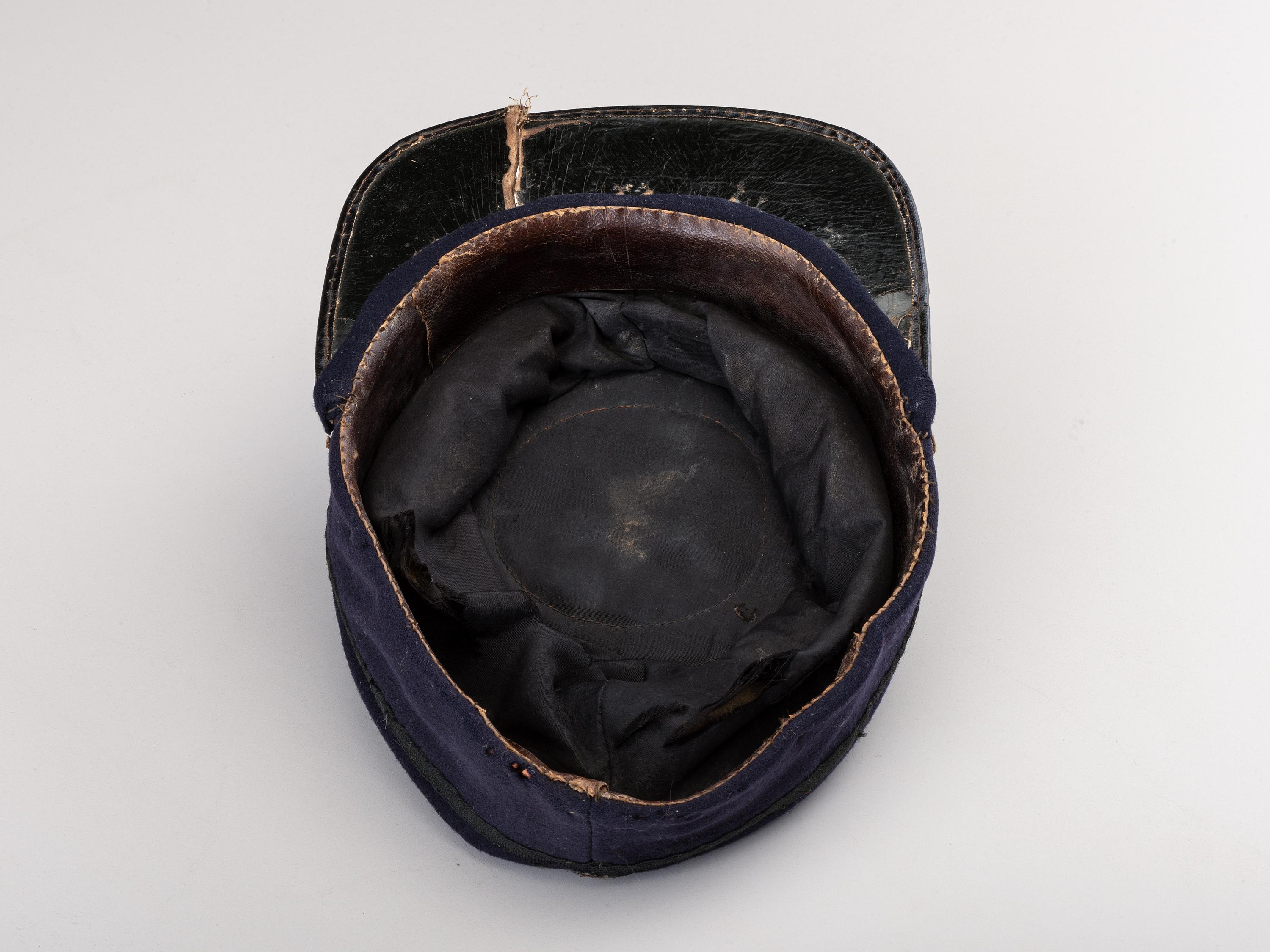 [CIVIL WAR]. Private purchase officer's sack coat, kepi, and carpet bag identified to Lieutenant Albert C. Sparks, Co. B, 37th Massachusetts Volunteers.