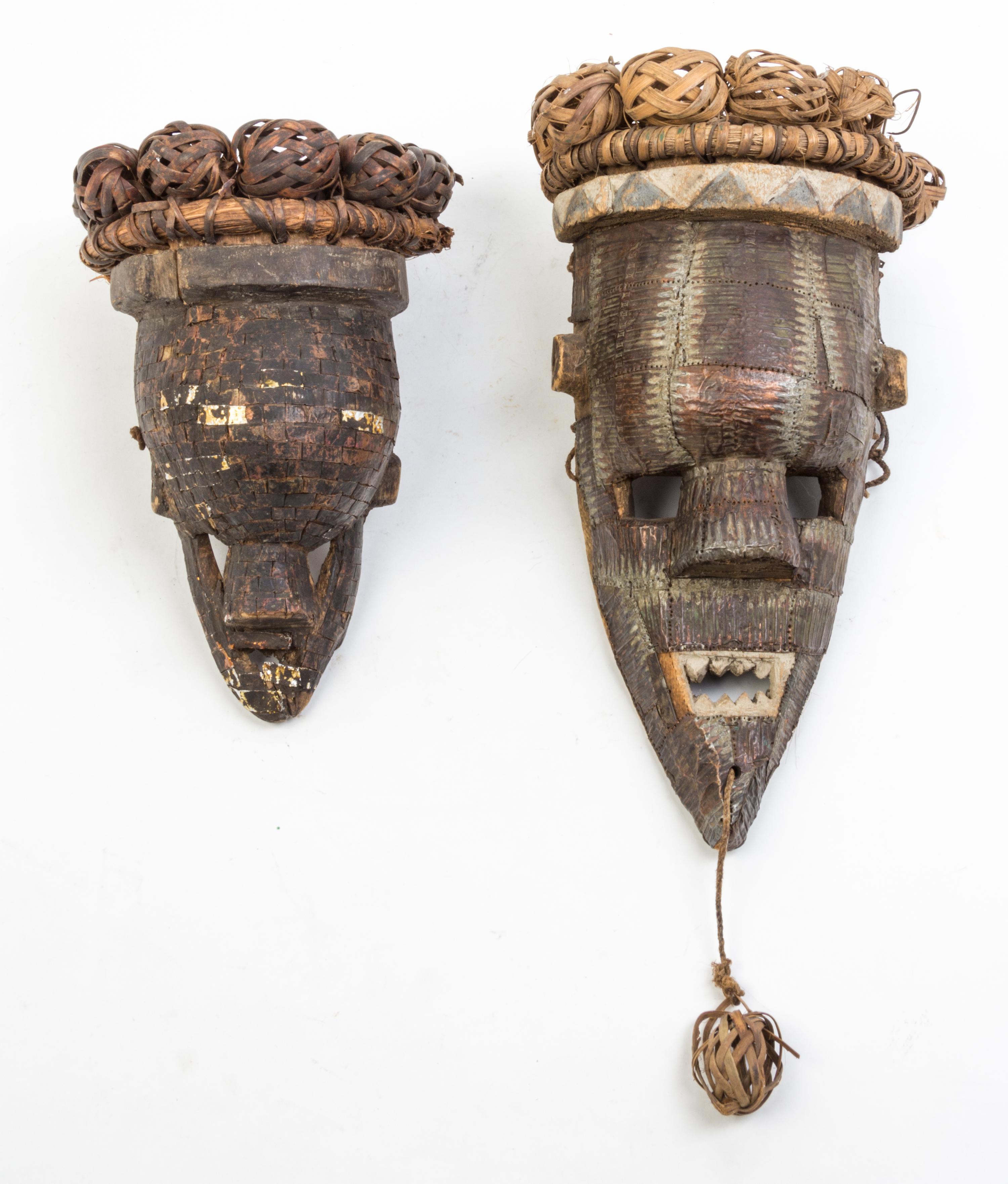 A Group of Six Masks Height of tallest 16 inches.