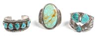 Three Southwestern Silver and Turquoise Bracelets Length of one 5 3/8 x opening 1 x width 1 7/8 inches