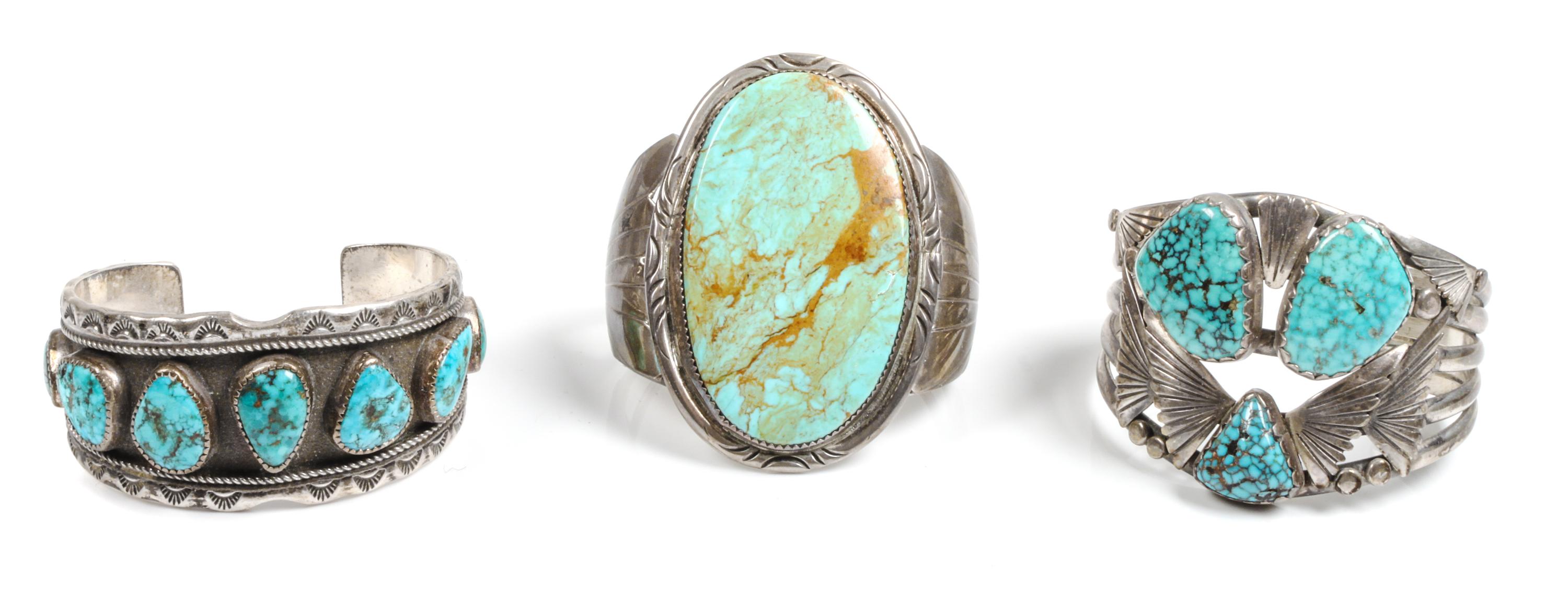Three Southwestern Silver and Turquoise Bracelets Length of one 5 3/8 x opening 1 x width 1 7/8 inches