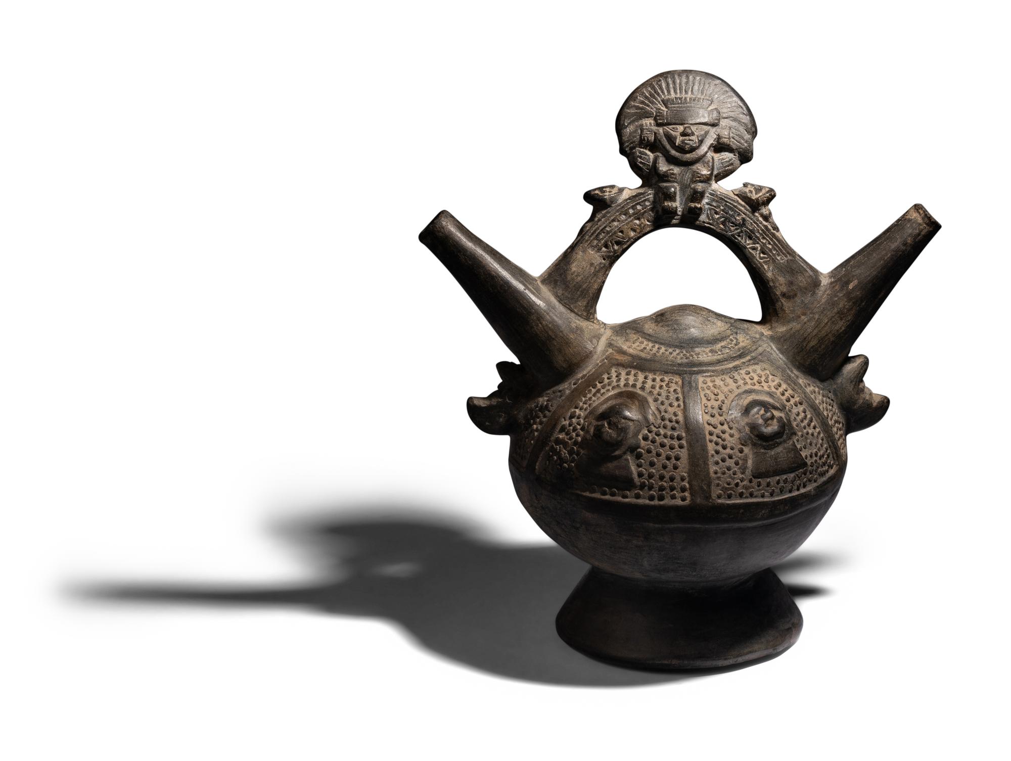 A Sican Blackware Stirrup Vessel