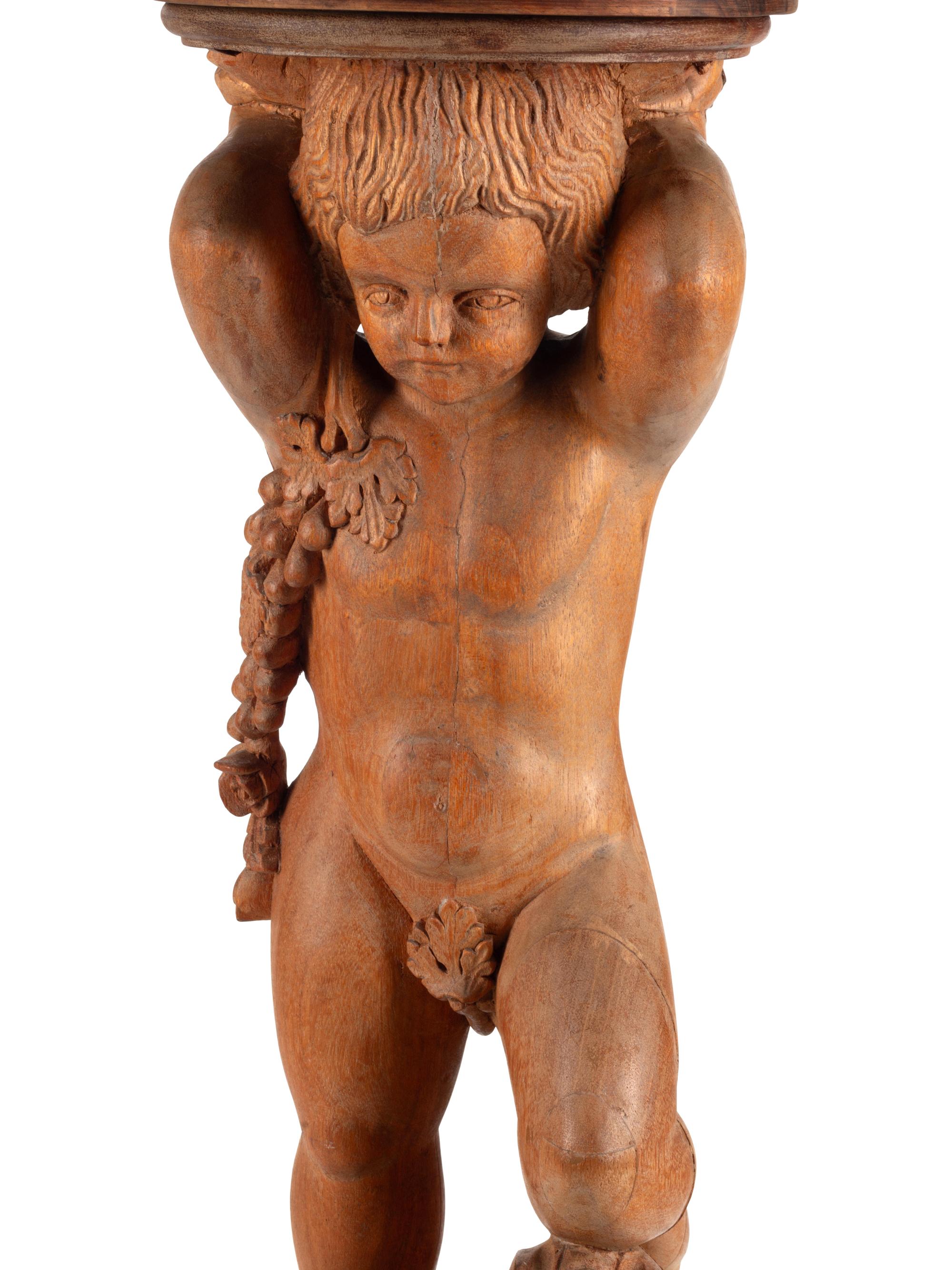 A Continental Carved Oak Figural Pedestal