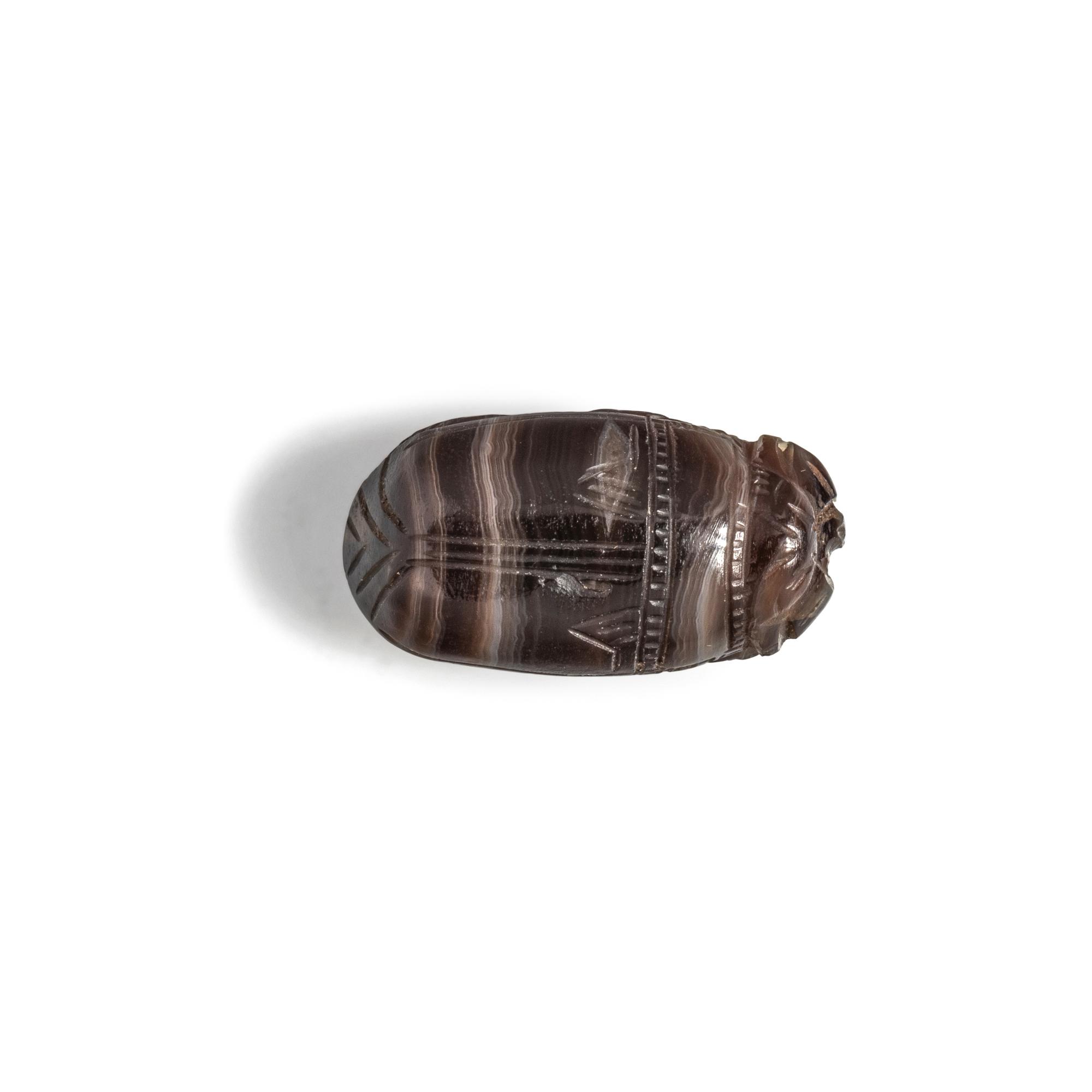 An Etruscan Banded Agate Scarab with Heracles Fighting Kyknos